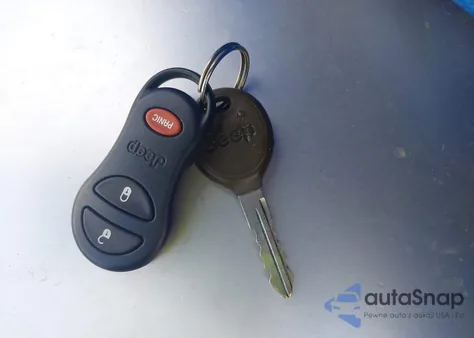 2000 Jeep Grand Cherokee Laredo z USA, uszkodzony, nr VIN 1J4GW48S3YC288398